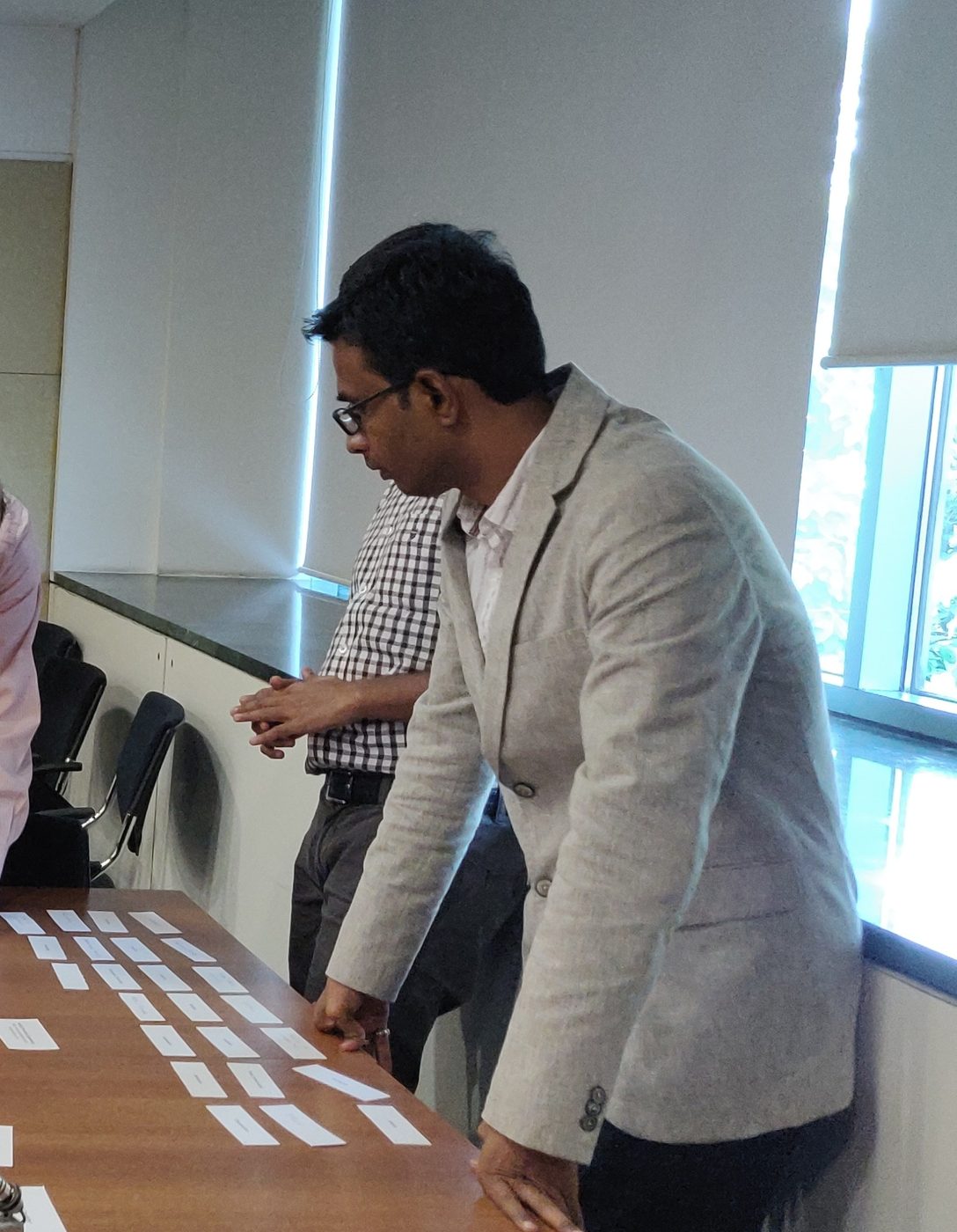 Reviewing cards laid out on a table