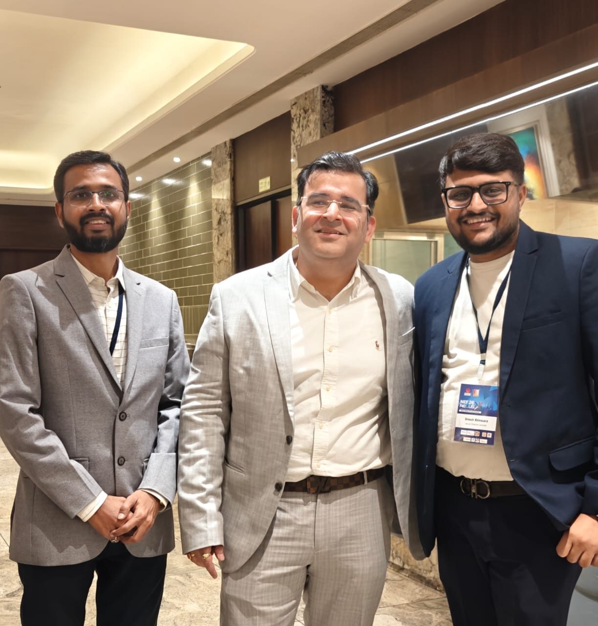 With two colleagues at an event